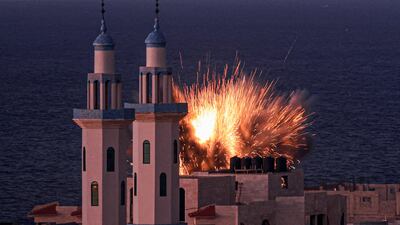 A fireball erupts from an Israeli airstrike in Gaza city. AFP
