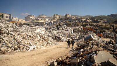 Rubble of collapsed houses in the town of Harim, near Idlib. EPA