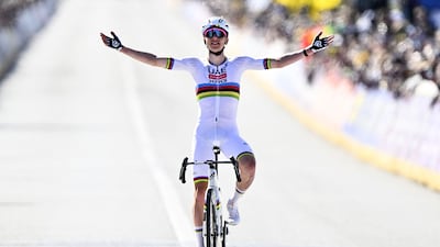 Slovenian Tadej Pogacar of UAE Team Emirates celebrates after winning the men's race of the Tour of Flanders. AFP