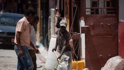 A worker shovels sands at a construction site in Port-au-Prince. The earthquake’s epicentre was about 125 kilometres west of the Haitian capital, the US Geological Survey said.