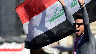 An Iraqi university student shouts slogans during a protest in central Baghdad, Iraq. EPA