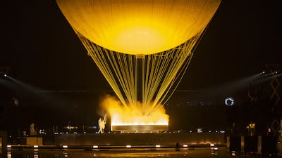 The Olympic torch will be extinguished as part of the closing ceremony. Bloomberg