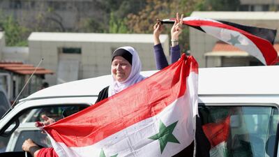 Nationalist sentiment was widespread during the gathering to show support for the Syrian government. Youssef Badawi / EPA