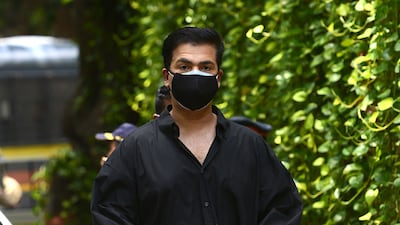 Bollywood film producer and director Karan Johar arrives to pay respect at the residence of Indian actor Dilip Kumar, after he died at the age of 98 in Mumbai on July 7, 2021.