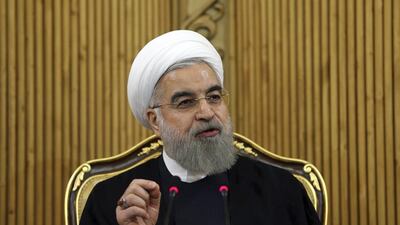 The United States fears imposing sanctions against Iran will harm president Hassan Rouhani’s prospects as elections near. Ebrahim Noroozi / AP Photo