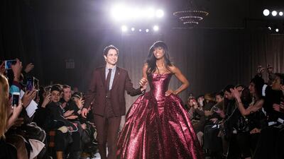 Zac Posen and model Naomi Campbell on the runway after his autumn 2015 New York fashion week show. AP