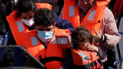 Migrants are taken in to Dover, Kent, from a small boat on the English Channel on July 8. PA