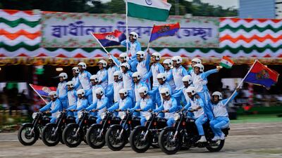 Police commandos from India's Assam state put on a display during Independence Day celebrations, in Guwahati. AP