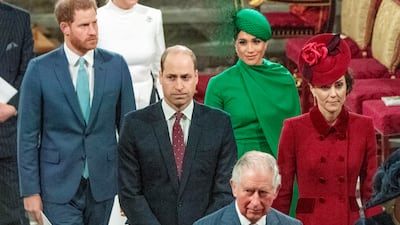 From left: Prince Harry, Prince William and Prince Charles, who is now the monarch, with Meghan and Kate. AP