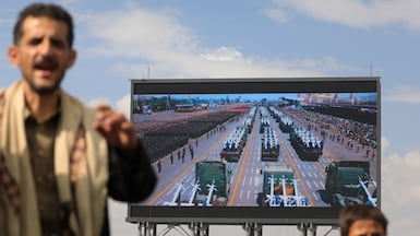A digital billboard displays missiles and drones during a Houthi demonstration in Sanaa, Yemen. EPA