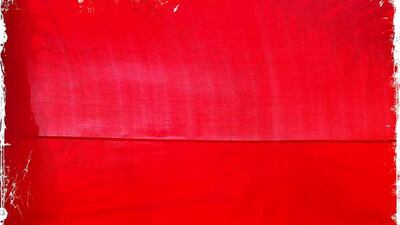 Day trip with friends to the Western Region and the Mazayin Dhafra Camel Festival, 220 kms west of Abu Dhabi on December 20, 2013. The UAE flag was wrapped around some palm trees outside the Tilal Liwa Hotel. Picture taken with the Hipstamatic app for the iPhone. Liz Claus / The National