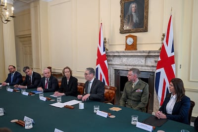 (L-R) HFW Global Head of Shipping Paul Dean, HSBC UK CEO David Lindberg, Equinor CEO Anders Opedal, BP CEO appointee Meg O'Neill, Britain's Prime Minister Keir Starmer, Major General Richard Cantrill, Commander Operations (Royal Navy), and CMA CGM Managing Director UK Natasha Griffin Jaimi Joy / POOL / AFP