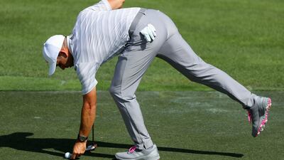 Sergio Garcia of Spain marks his ball on the third green during the third round of the Omega Dubai Desert Classic. Getty