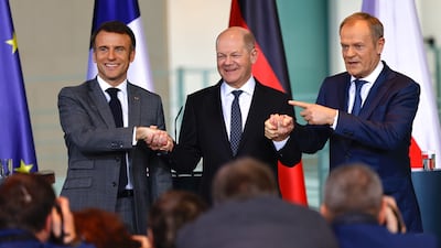 From left, French President Emmanuel Macron, German Chancellor Olaf Scholz and Poland's Prime Minister Donald Tusk put on a show of unity in Berlin. EPA