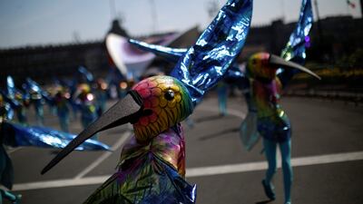 Participants dressed as hummingbirds perform during the annual Day of the Dead parade in Mexico City. Reuters