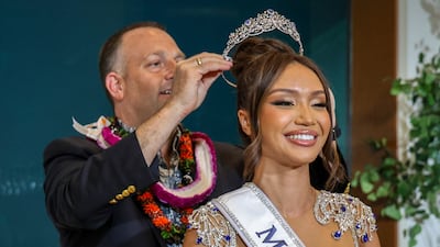 Hawaii Governor Josh Green crowns Savannah Gankiewicz as Miss USA 2023 in Honolulu. AP