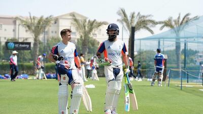 James Taylor, left, and Moeen Ali prepare for a nets session at Dubai Sports City. Gareth Copley / Getty Images