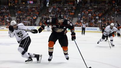Teemu Selanne, centre, of the Anaheim Ducks skates away from Slava Voynov of the Los Angeles Kings in the first period of Game 7 of their NHL play-off series on May 16, 2014 in Anaheim, California. The Kings defeated the Ducks 6-2. Jeff Gross/Getty Images
