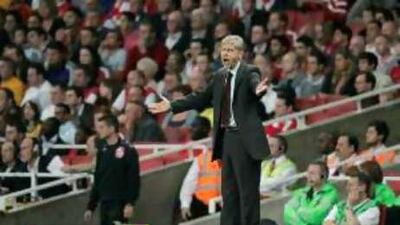 Arsene Wenger was left wincing and dealing with a serious bout of home sickness.