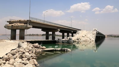 A bridge that was destroyed by ISIS after they took control of the river crossing and rebuilt the bridge as US-backed Kurdish and Arab fighters advance into ISIS's bastion of Manbij, in northern Syria, on June 23, 2016. AFP