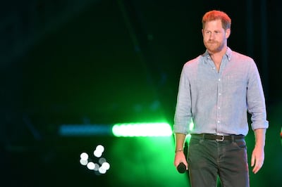 Prince Harry arrives onstage to speak during the taping of the Vax Live in California. AFP