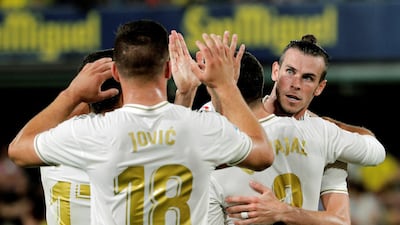 Real Madrid's Gareth Bale (R) reacts during a Spanish LaLiga soccer match between Villarreal and Real Madrid at the Ceramica stadium in Villarreal, eastern Spain. EPA