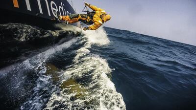 Dave Swete of Team Alvamedica checks for debris on the keel during Leg 3 of the Volvo Ocean Race. Amory Ross / Team Alvamedica