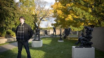John Metcalfe, a newspaper reporter born near the US capital, strikes a pose in the Sculpture Garden of the Hirshhorn Museum.