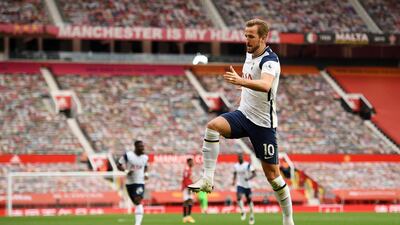 Spurs striker Harry Kane celebrates scoring his team's third goal. AFP