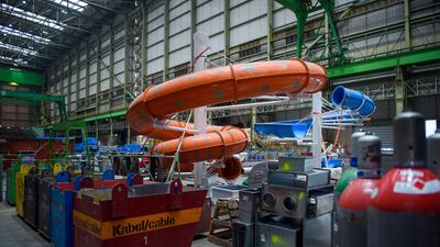 A water slide designed for the 'Global Dream' sits in the assembly hall. AFP