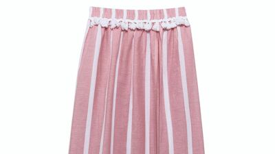 Everyone needs a lightweight skirt on holiday, and we love this striped pom-pom number; Dh218, Asos 