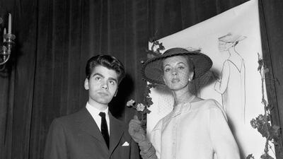 At the age of 21, Lagerfeld won first prize in the coat category at the Fashion Design Competition in Paris, on December 11, 1954. Getty Images
