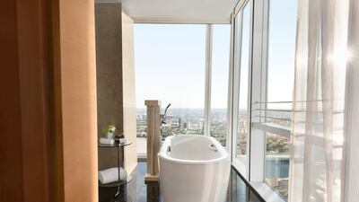 Some rooms and suites have city views from the bathroom