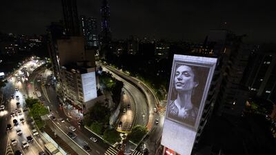 Five years after her death, an image of councillor Marielle Franco is projected in central Sao Paulo, Brazil. EPA