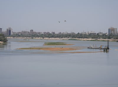 Significantly lower water levels on the Tigris River in Baghdad. AP Photo