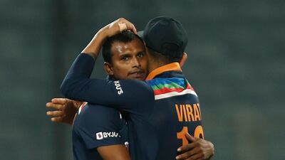 T. Natarajan bowled an excellent last over as India defeated England by seven runs in the third ODI in Pune to take the series 2-1. Reuters