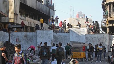 Iraqi protesters gather on Al Rashid street in the capital Baghdad amid ongoing anti-government demonstrations on December 19, 2019. AFP