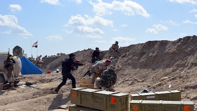 Iraqi government forces and allied militias take a position in the northern part of Diyala province as part of an assault to retake the city of Tikrit from ISIS, on March 2, 2015. All photos: AFP