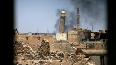 The leaning minaret of Iraq’s Grand Al Nuri Mosque is seen through a window in the old city of Mosul on June 1, 2017, just weeks before it was destroyed by ISIL. Alaa Al Marjani / Reuters