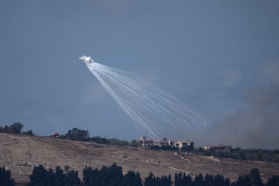 Israeli shelling hits an area in southern Lebanon, seen from northern Israel. AP