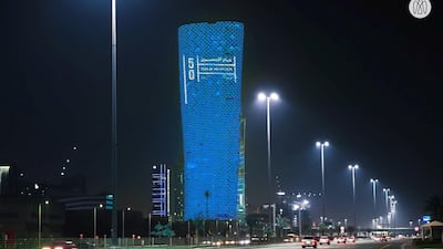 Capital Gate on Khaleej Al Arabi Street lights up in celebration of the Year of the 50th. Abu Dhabi Media Office