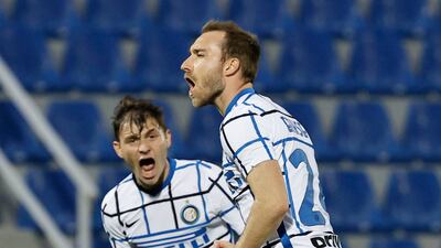 Inter Milan's Christian Eriksen celebrates with Nicolo Barella after scoring their first goal. Reuters