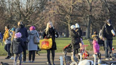 People visit Kensington Palace Gardens. Reuters