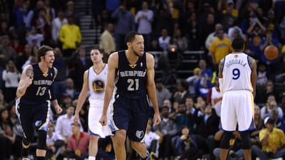 Memphis Grizzlies, in black, narrowly edged the Golden State Warriors in Oakland. John G Mabanglo / EPA