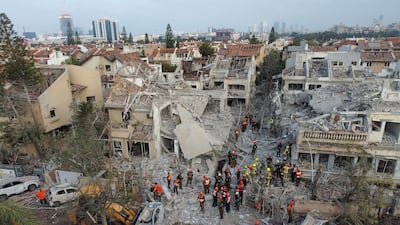 Israeli rescue teams at the site of an Iranian ballistic missile strike on residential Rishon LeZion, near Tel Aviv, where 21 people were injured. EPA