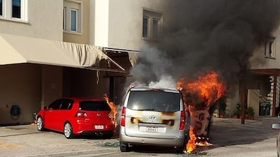 A car burst into flames and another one caught fire in Al Reef on Sunday morning. Security teams succeeded in containing the fire until Civil Defence could reach the scene.