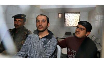 Abdulelah Haidar Shai, right, and Abdul Karim al Shami, centre, were convicting of working with al Qa'eda in Yemen.