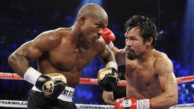 Manny Pacquiao and Timothy Bradley, during their last fight in 2012. Chris Carlson / AP