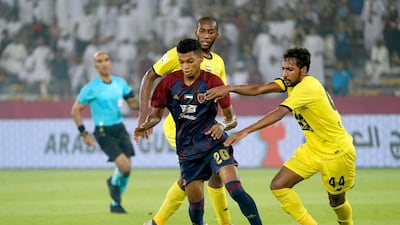 Yahya Al Ghassani, centre, has been impressive in such a short span in the Arabian Gulf League. Al Wahda