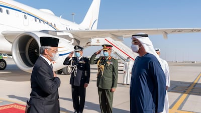 Sheikh Mohamed bin Zayed, Crown Prince of Abu Dhabi and Deputy Supreme Commander of the Armed Forces, receives Sultan Abdullah Sultan Ahmad Shah, King of Malaysia, at the Presidential Airport. Mohamed Al Hammadi / Ministry of Presidential Affairs